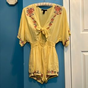 A flowy romper with floral designs from Forever 21.